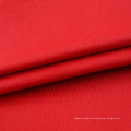 Textiles de punto liso personalizado 100% Poliéster Sus materiales oscuros cubren tela de agua con recubrimiento de cuero PU para vestido